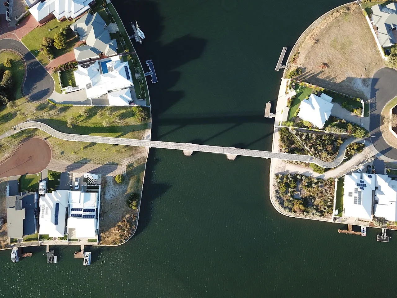 Aerial view of the footbridge across a Port Geographe canal